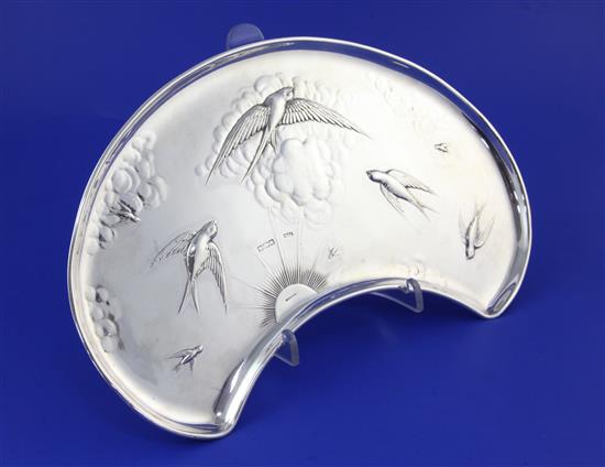 An Edwardian kidney shaped silver tray with aesthetic decoration, 11.5 in.